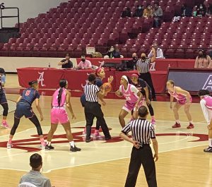 Jasmine Walker of Alabama gets ready to tip off versus Shakira Austin of Ole Miss.