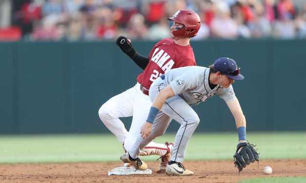 Alabama fends off Bulldogs to get midweek win